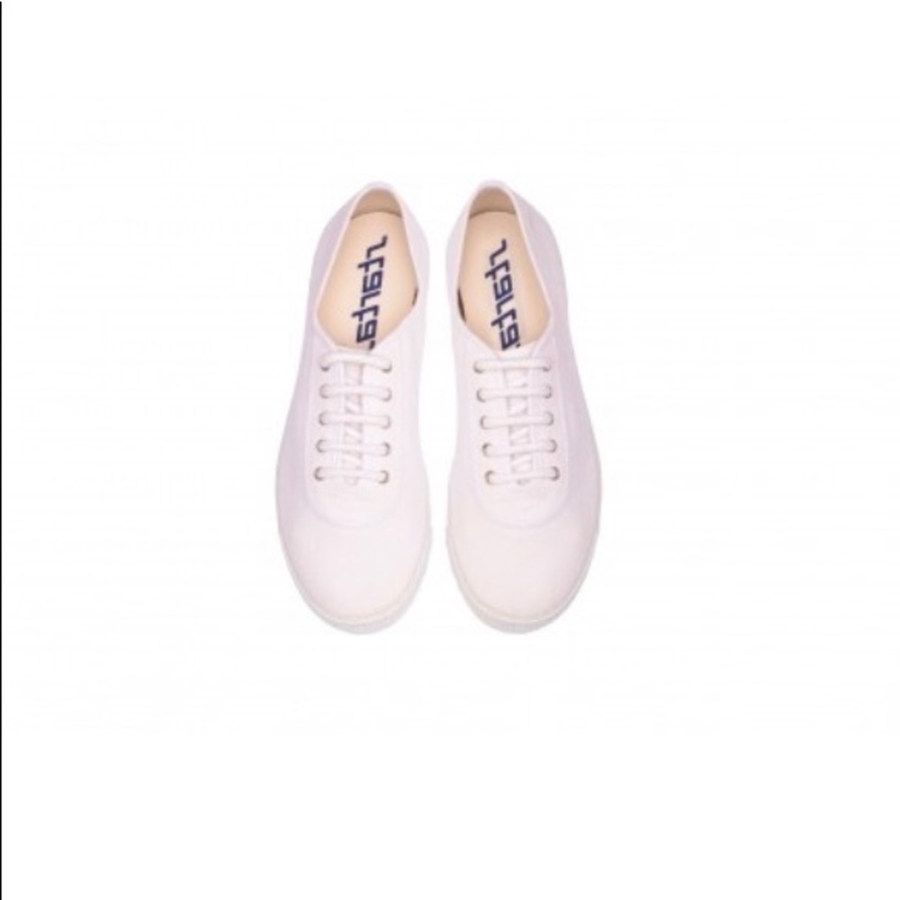 Soft pink canvas shoes, size US W 9, like new.